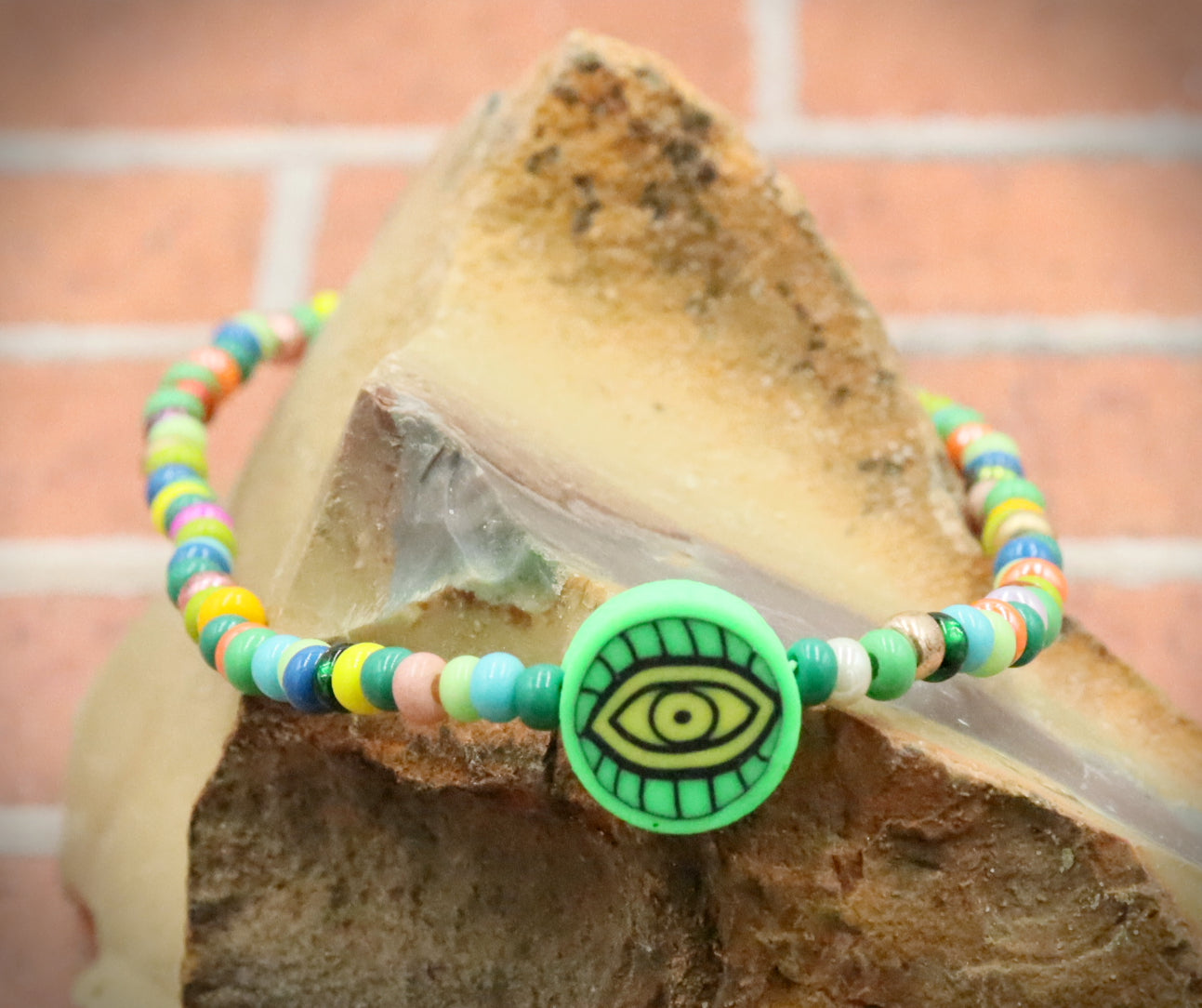 Green Eye of Envy Evil Eye Charm Colorful Seed Bead Stretch Bracelet by Monkey's Mojo