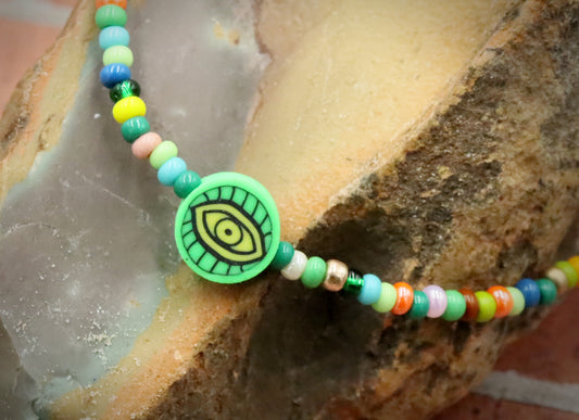 Green Eye of Envy Evil Eye Charm Colorful Seed Bead Stretch Bracelet by Monkey's Mojo