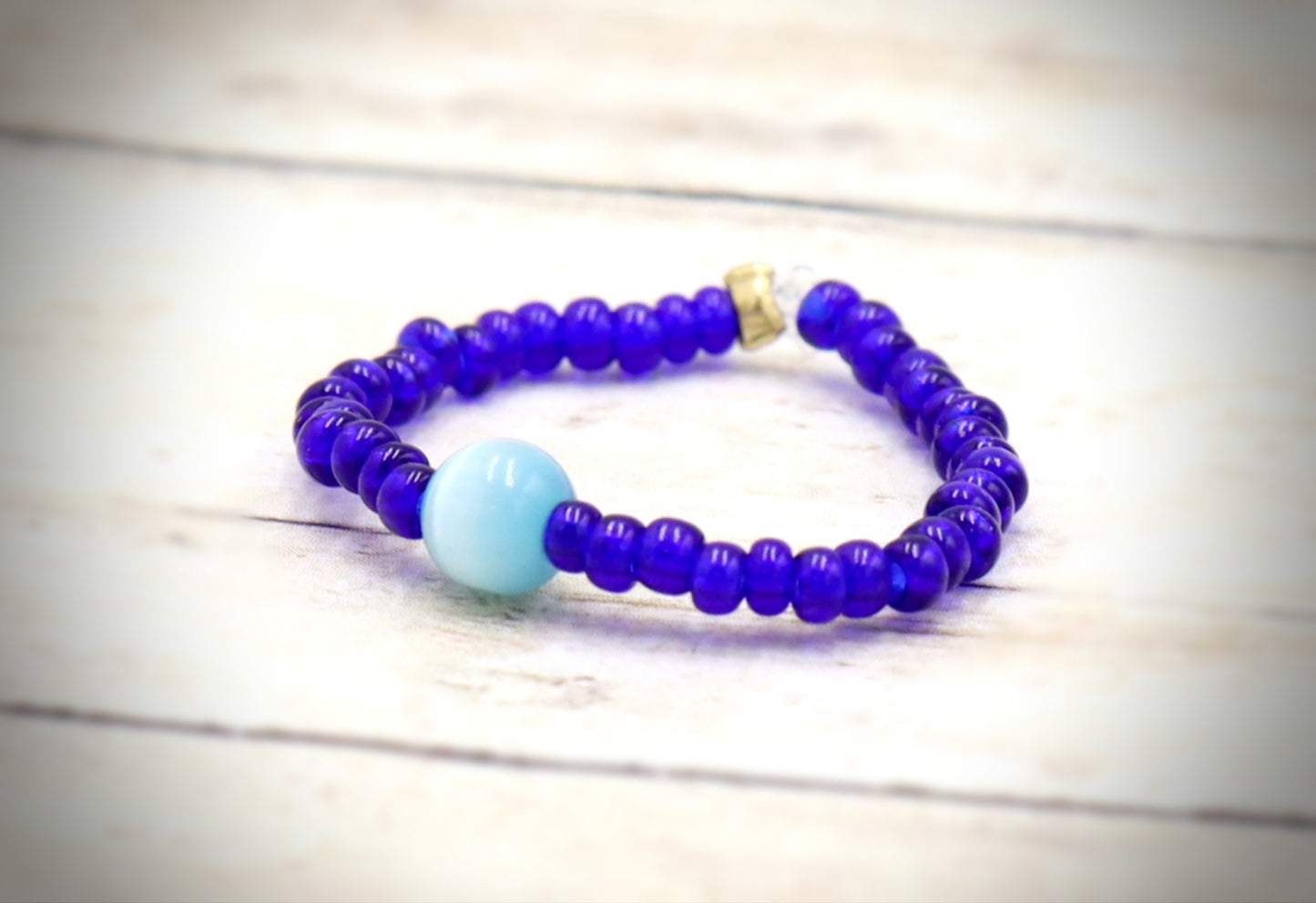 Cat's Eye On the Price - Synthetic Cat's Eye and Blue Glass Bead Stretch Ring by Monkey's Mojo