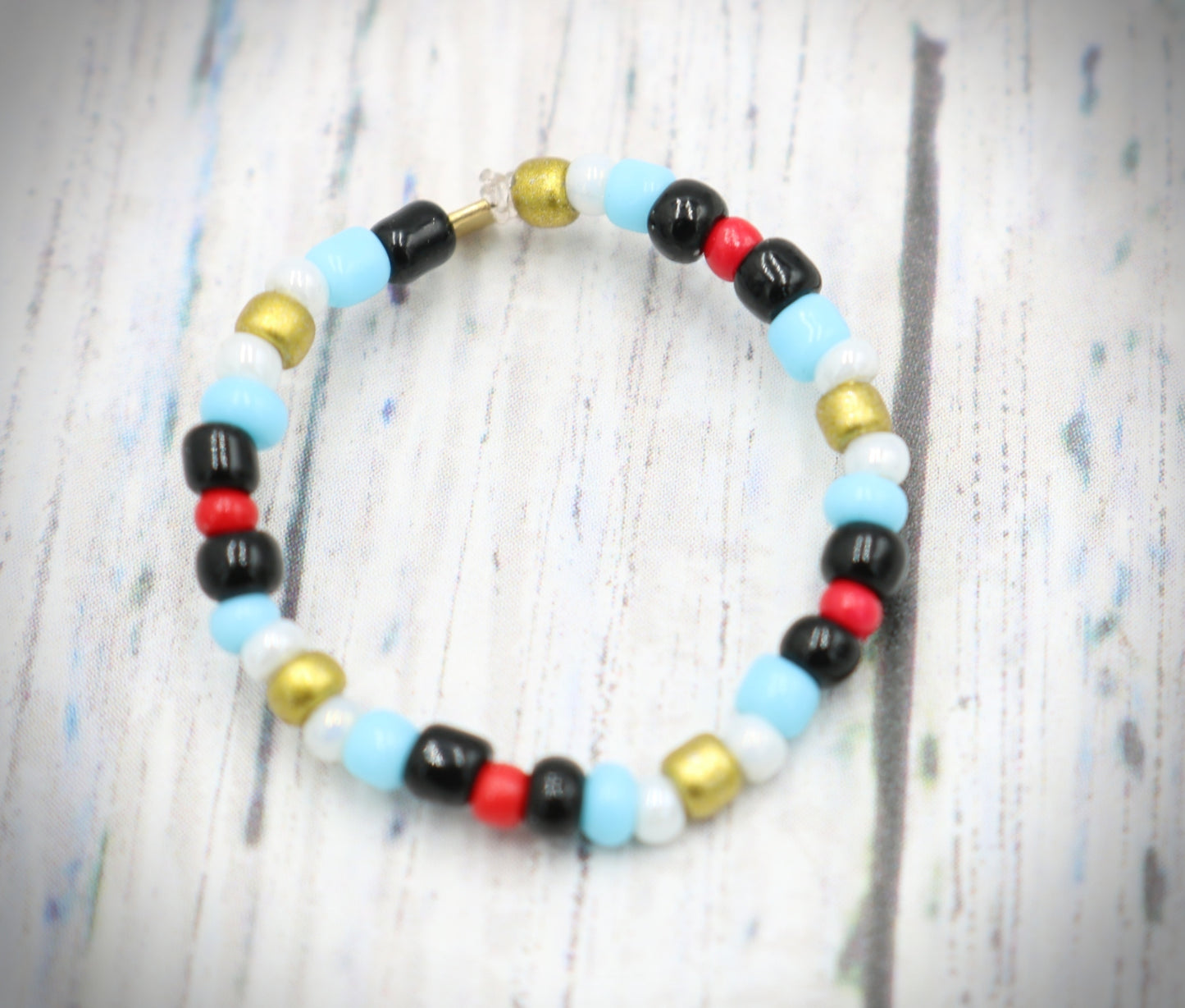 Pointing Your Finger Like an Egyptian Smooth Walking Glass Bead Stretch Stack Ring by Monkey's Mojo