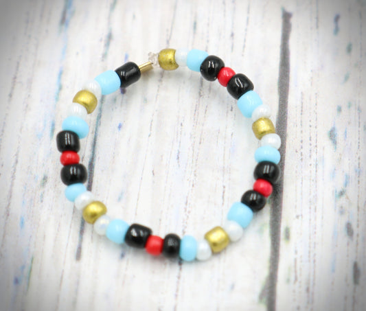 Pointing Your Finger Like an Egyptian Smooth Walking Glass Bead Stretch Stack Ring by Monkey's Mojo