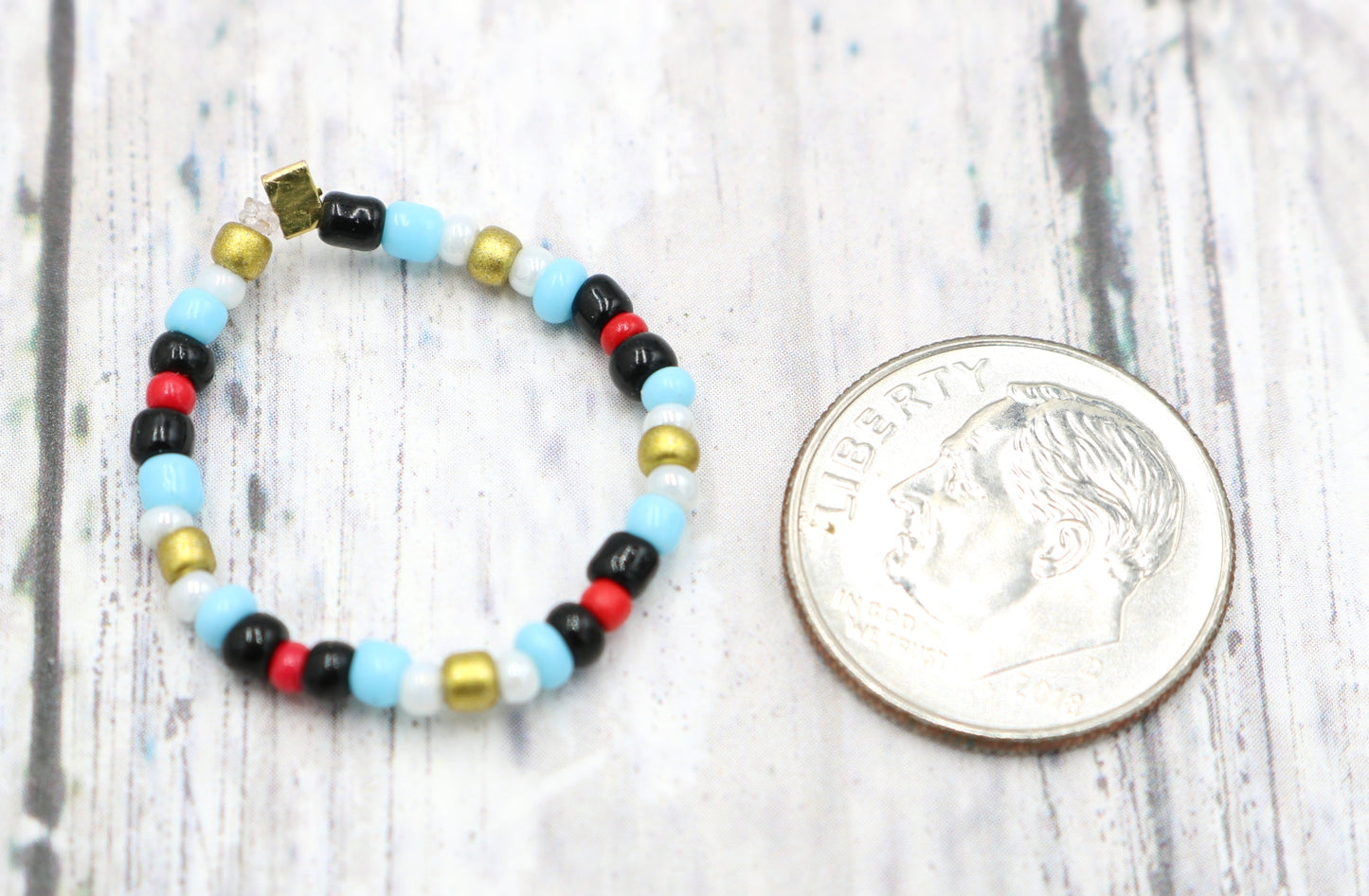 Pointing Your Finger Like an Egyptian Smooth Walking Glass Bead Stretch Stack Ring by Monkey's Mojo