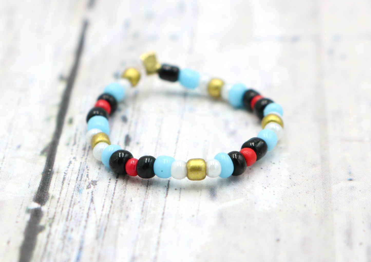 Pointing Your Finger Like an Egyptian Smooth Walking Glass Bead Stretch Stack Ring by Monkey's Mojo